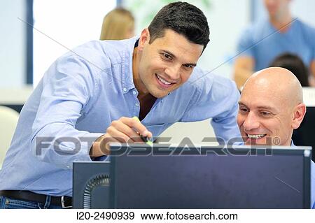 Stock Photo - Executives. Office.. Fotosearch