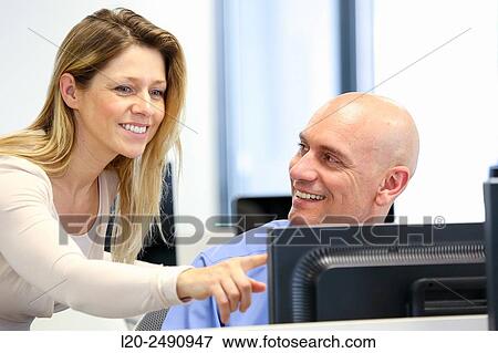 Stock Photo - Executives. Office.. Fotosearch