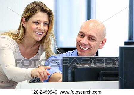 Stock Photo - Executives. Office.. Fotosearch
