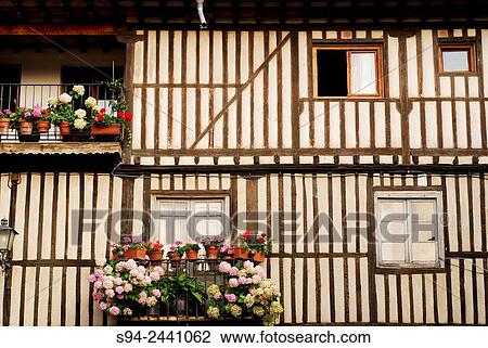 Stock Image - Facade in the square of the church in La Alberca, Salamanca, Spain.. Fotosearch