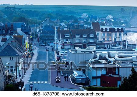 Stock Photo - France, Normandy Region, Calvados Department, D-Day Beaches Area, Arromanches les Bains, elevated town view, dusk. Fotosearch