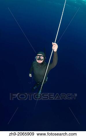 freediver, Aegean Sea, island Symi, Greece. View Large Photo Image Stock Photo - freediver, Aegean Sea, island Symi, Greece.. Fotosearch