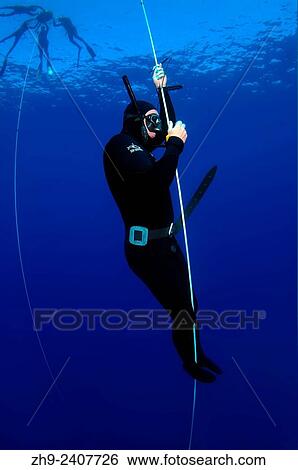 Stock Photograph - freediver, Aegean Sea, island Symi, Greece.. Fotosearch