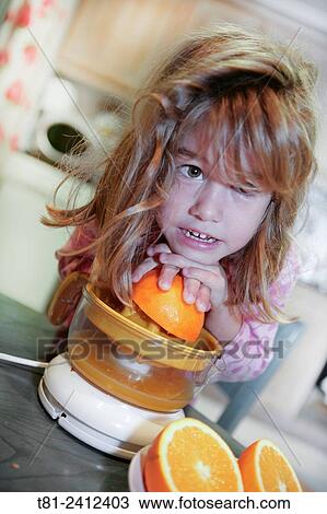 Girl Preparing orange juice, en valencia View Large Photo Image Stock Image - Girl Preparing orange juice, en valencia. Fotosearch