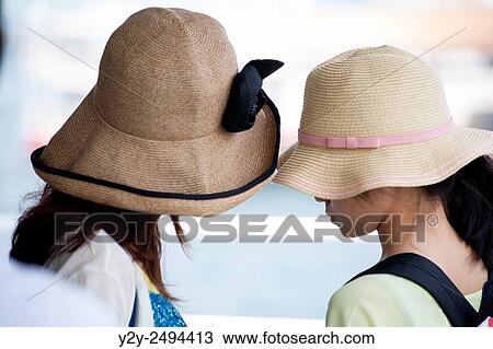 Girls with hat View Large Photo Image Stock Image - Girls with hat. Fotosearch