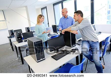 Group of teachers. Computer Academy. View Large Photo Image Stock Image - Group of teachers. Computer Academy.. Fotosearch