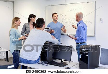 Group of teachers. Computer Academy. View Large Photo Image Stock Photo - Group of teachers. Computer Academy.. Fotosearch