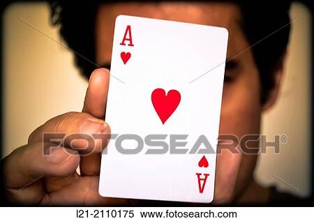 Hand holding a card ace of hearts. Face out of focus. View Large Photo Image Stock Photography - Hand holding a card ace of hearts. Face out of focus.. Fotosearch