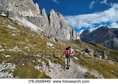 Stock Image - Heading to the Zigolade Pass across the Catinaccio in the Dolomites of Italy.. Fotosearch