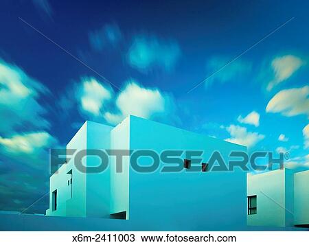 Houses and clouds. Marina Rubicon, Playa Blanca. Lanzarote, Canary Islands, Spain, Europe. View Large Photo Image Stock Image - Houses and clouds. Marina Rubicon, Playa Blanca. Lanzarote, Canary Islands, Spain, Europe.. Fotosearch