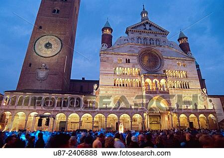 Stock Photo - Italy, Lombardy, Cremona, the Duomo and the Torrazzo during Torrone Feast.. Fotosearch