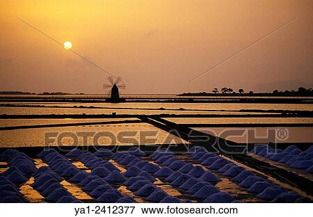 Italy, Sicily, Marsala, saline at sunset View Large Photo Image Stock Photo - Italy, Sicily, Marsala, saline at sunset. Fotosearch