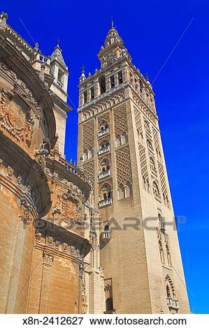 Stock Photo - La Giralda Tower, Cathedral of Saint Mary of the See (Catedral de Santa Maria de la Sede), Seville, Andalusia, Spain.. Fotosearch