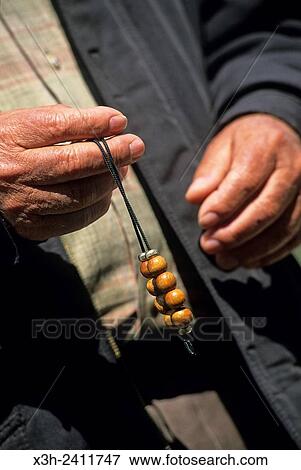 man manipulating a ´´komboloi´´ worry beads, Ermioni, Argolid region, Peloponnese, Greece, Southern Europe. View Large Photo Image Stock Photo - man manipulating a ´´komboloi´´ worry beads, Ermioni, Argolid region, Peloponnese, Greece, Southern Europe.. Fotosearch