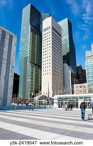New York, USA. United States Embassy / Permanent Representation to the United Nations and surrounding skyscrapers at UN Plaza, Manhattan. View Large Photo Image Stock Photo - New York, USA. United States Embassy / Permanent Representation to the United Nations and surrounding skyscrapers at UN Plaza, Manhattan.. Fotosearch