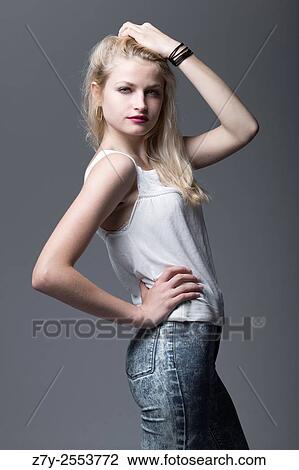 Stock Image - Portrait of a russian young teen model with blue eyes.. Fotosearch