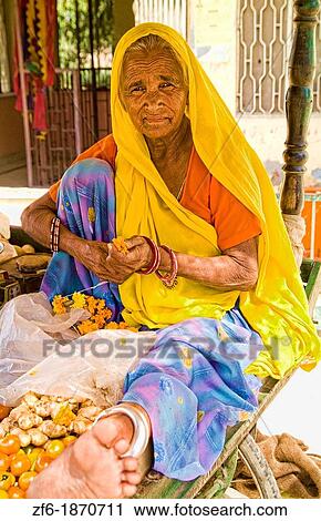 Portrait of older woman Hindu vendor in Jaipur Rajasthan India View Large Photo Image Stock Image - Portrait of older woman Hindu vendor in Jaipur Rajasthan India. Fotosearch