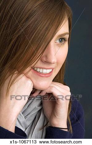 Stock Image - Portrait of young woman. Fotosearch