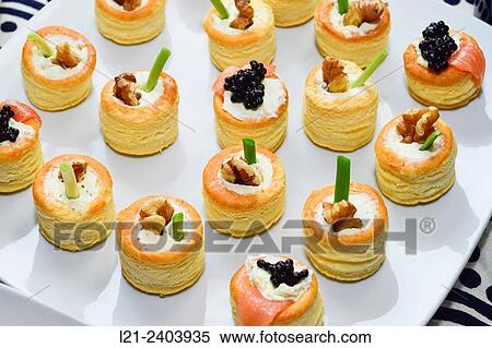 Round pastry pies two flavors: cheese and nuts, and cheese, salmon and turtle eggs. View Large Photo Image Stock Photography - Round pastry pies two flavors: cheese and nuts, and cheese, salmon and turtle eggs.. Fotosearch