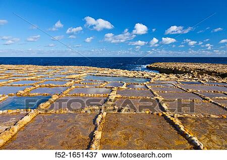 Salt Pans, Qbajjar Village, Gozo Island, Malta, Europe View Large Photo Image Stock Photo - Salt Pans, Qbajjar Village, Gozo Island, Malta, Europe. Fotosearch