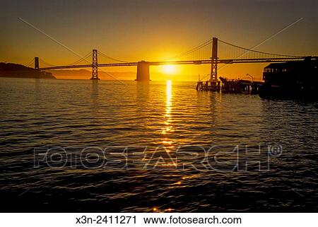 SAN FRANSISCO, CALIFORNIA - Golden Gate Bridge silhouetted at sunset. View Large Photo Image Stock Image - SAN FRANSISCO, CALIFORNIA - Golden Gate Bridge silhouetted at sunset.. Fotosearch