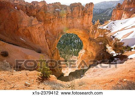 Sandstone arch in Bryce Canyon resembles a giant keyhole. View Large Photo Image Stock Image - Sandstone arch in Bryce Canyon resembles a giant keyhole.. Fotosearch