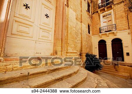 Stock Photo - Small square in Vittoriosa (Birgu) in Malta island, Malta.. Fotosearch
