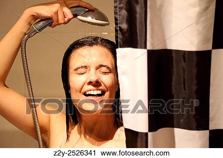 Smily young woman with eyes closed showering. View Large Photo Image Stock Image - Smily young woman with eyes closed showering.. Fotosearch