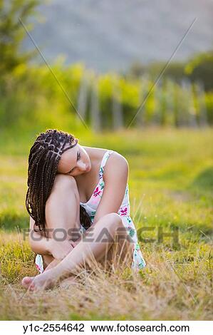 Stock Image - Stock Photo - Country-girl hiding face is concerned. Fotosearch