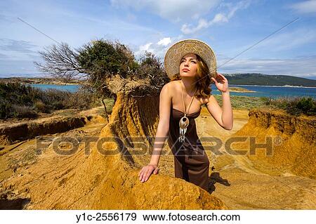 Stock Photo - Stock Photo - Teen girl fanciful enjoying sunlight in wilderness. Fotosearch