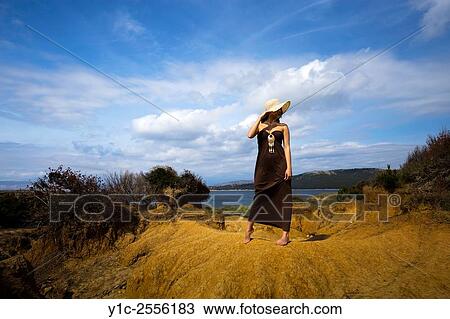 Stock Photo - Teen girl in long dress in wilderness View Large Photo Image Stock Image - Stock Photo - Teen girl in long dress in wilderness. Fotosearch