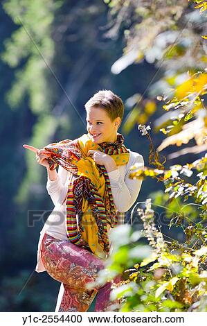 Stock Image - Stock Photo - Teenager girl makes choice with finger. Fotosearch