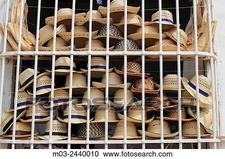 Street scene, hat shop display behind iron bars in window, Trinidad, Cuba View Large Photo Image Stock Image - Street scene, hat shop display behind iron bars in window, Trinidad, Cuba. Fotosearch