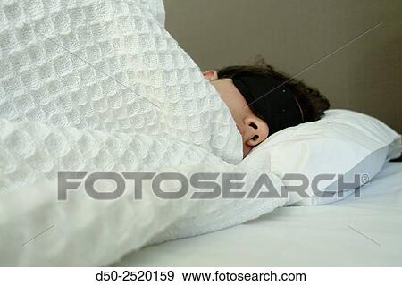 Teenager sleeping View Large Photo Image Stock Photo - Teenager sleeping. Fotosearch