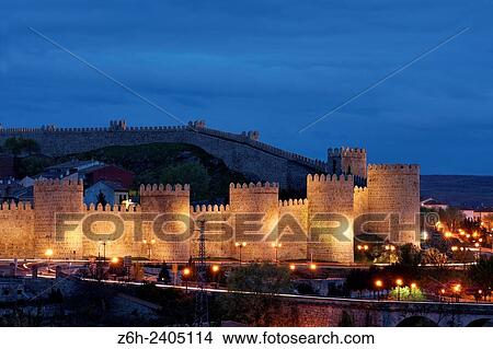 Picture - The city of Avila, Spain, at dusk.. Fotosearch