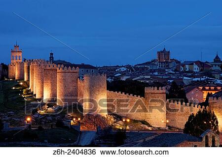 Stock Photograph - The city of Avila, Spain, at dusk.. Fotosearch