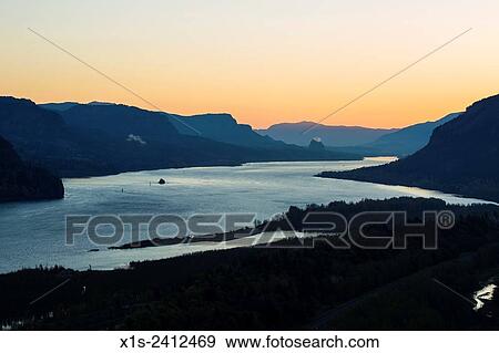 The Columbia River Gorge is a national recreation area and the river separates the states of Oregon and Washington. View Large Photo Image Stock Photo - The Columbia River Gorge is a national recreation area and the river separates the states of Oregon and Washington.. Fotosearch