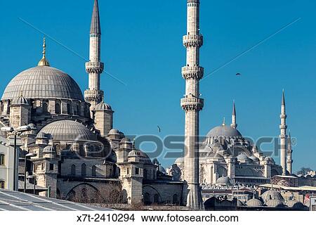 Picture - The Yeni mosque at Eminonu with the Suleymaniye mosque in the background. Istanbul, Turkey.. Fotosearch