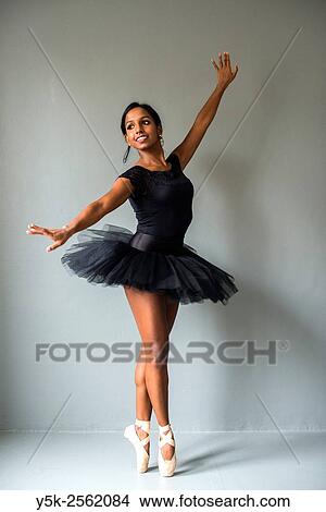 Tilburg, Netherland. Non caucausan female classical ballet dancer, studio shot. View Large Photo Image Picture - Tilburg, Netherland. Non caucausan female classical ballet dancer, studio shot.. Fotosearch