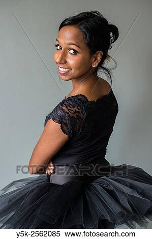 Tilburg, Netherland. Non caucausan female classical ballet dancer, studio shot. View Large Photo Image Stock Photography - Tilburg, Netherland. Non caucausan female classical ballet dancer, studio shot.. Fotosearch
