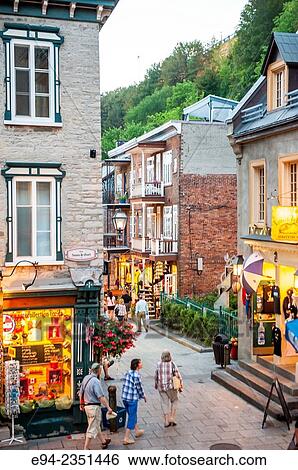 Stock Photograph - Twilight scene of the Rue du Petit Champlain. Quebec City, Canada. Fotosearch