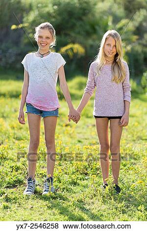 Twin sisters. View Large Photo Image Stock Photo - Twin sisters.. Fotosearch