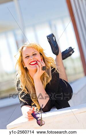 Very happy young lady View Large Photo Image Picture - Very happy young lady. Fotosearch