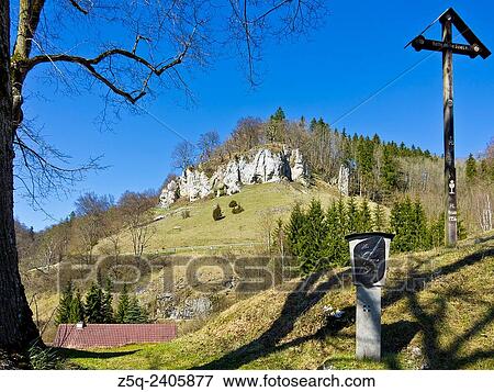 Stock Photo - View of limestone rocks from a station of a Way of the Cross in the village of Hutten, Swabian Alb, Germany.. Fotosearch