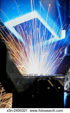 Welder with sparks flying. View Large Photo Image Stock Image - Welder with sparks flying.. Fotosearch