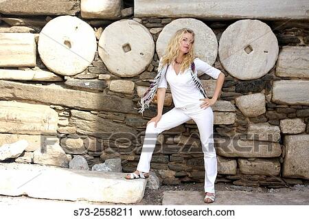 Stock Image - Woman in Paros, Cyclades Islands, Greece. Fotosearch