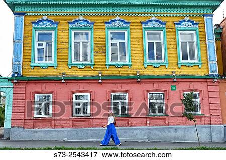 Stock Photo - Woman walking in a Kazan street, Tatarstan, Russia. Fotosearch