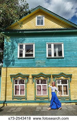 Stock Photo - Woman walking in a Kazan street, Tatarstan, Russia. Fotosearch
