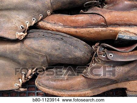 Working boots, flea market, Narbonne Plage, France View Large Photo Image Picture - Working boots, flea market, Narbonne Plage, France. Fotosearch