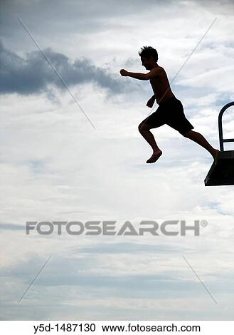 young man jumping from the tower to the jumps in the water, beach on the Geneva Lake in Geneva called ´Paquis plage´, Geneva, Switzerland View Large Photo Image Stock Image - young man jumping from the tower to the jumps in the water, beach on the Geneva Lake in Geneva called ´Paquis plage´, Geneva, Switzerland. Fotosearch